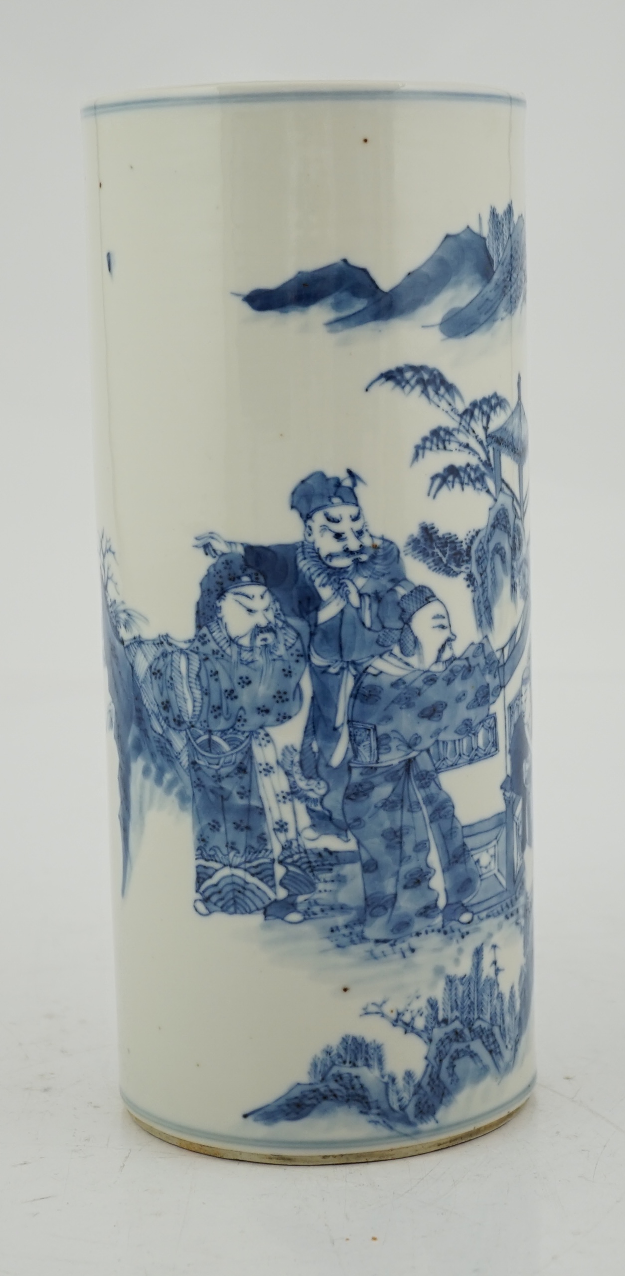 A Chinese blue and white ‘sages’ cylindrical brushpot, 19th century